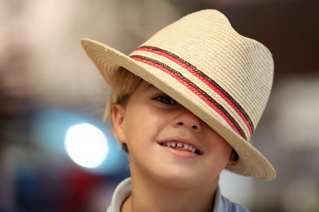 Child wearing a Fedora